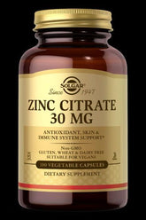Solgar Zinc Citrate 30 mg dietary supplement in a brown jar with 100 vegetable capsules for immune system support.